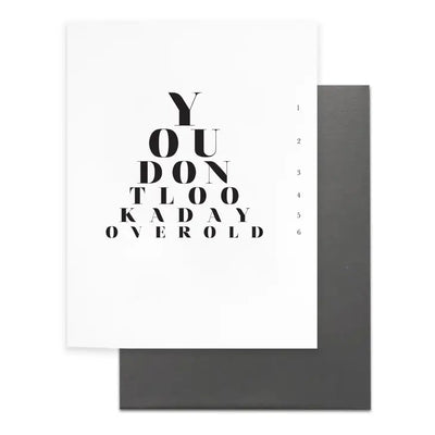 Birthday card, you dont' look a day over old. black and white blank inside. Humourous Birthday card