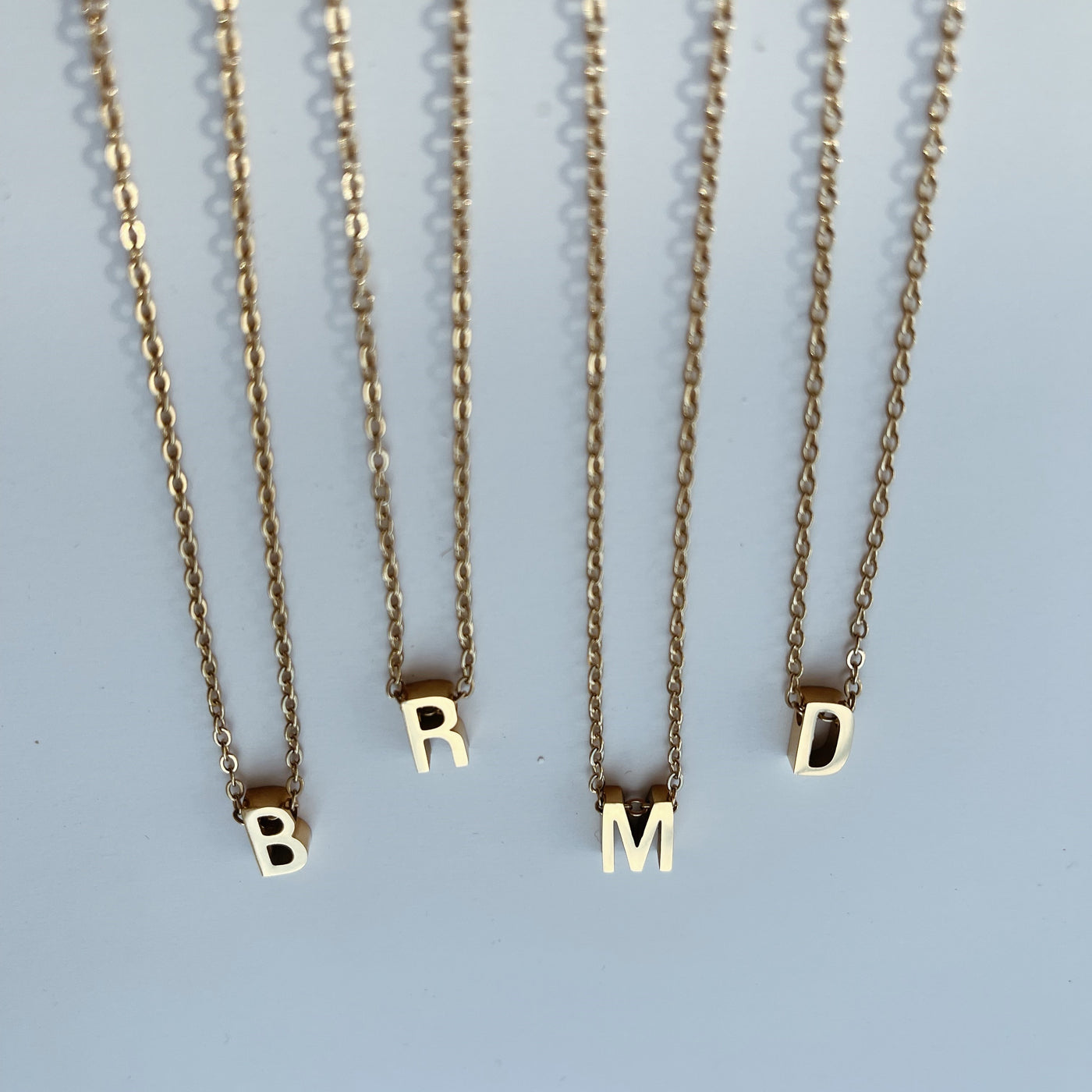 Petite gold initial necklace